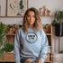 Our Cabin Life sweatshirt is perfect for those who love spending time in the great outdoors, whether it's camping, hiking, or simply enjoying a cozy night in a cabin.